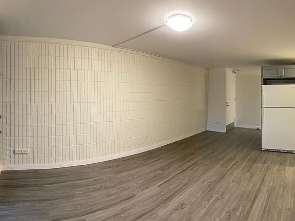 Large living room with great cross breeze and park view.