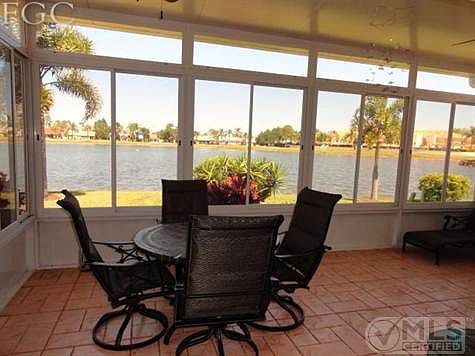 Huge Lanai overlooking Lake. Stamped Concrete Floor and Acr