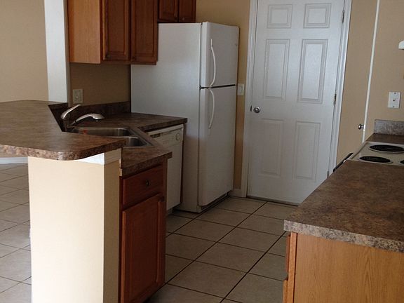 Kitchen door opens to garage