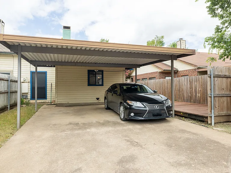 Carport behind house- 2 available spaces