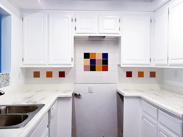 Kitchen refreshed with appliances including a hood range, stove, and refrigerator will be installed.