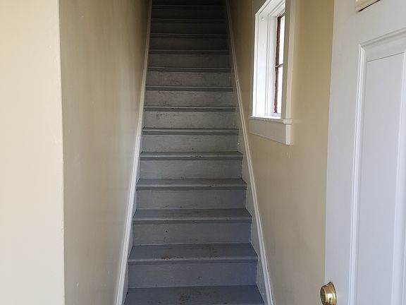 Stairs up to second floor