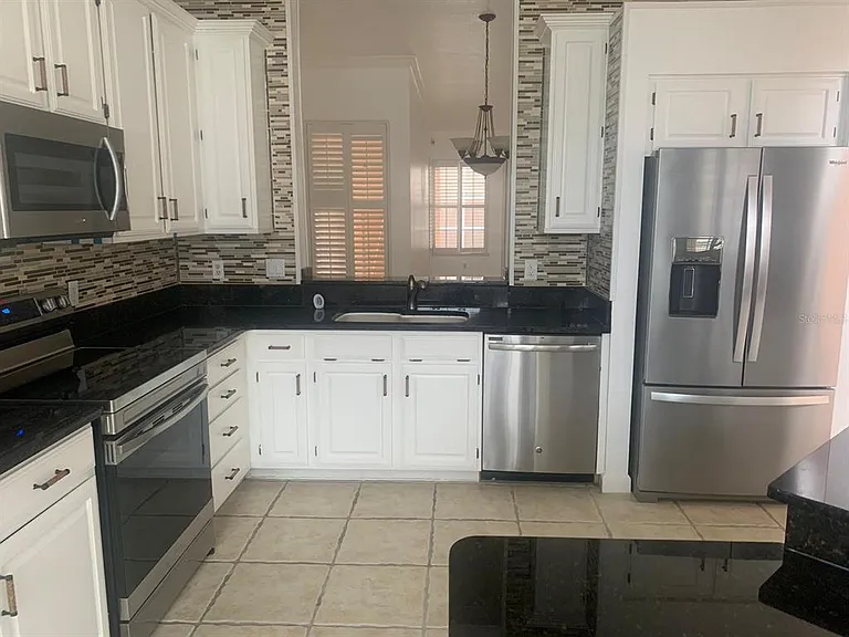 14428 Tambourine Dr — Photo 10