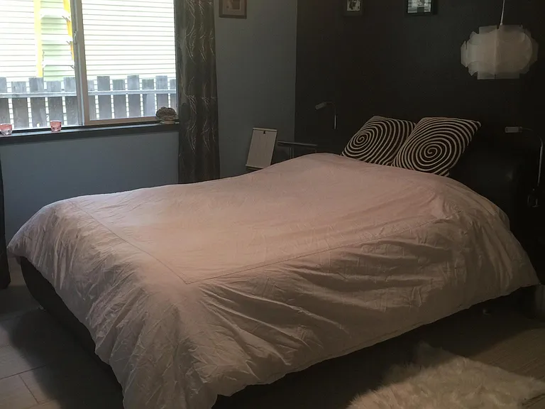 Back 3 Rd bedroom. Queen bed with movable glass side tables