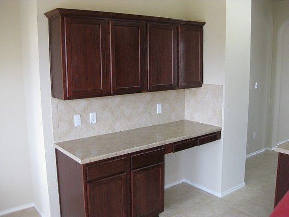 Built-in desk is ideal for home computer