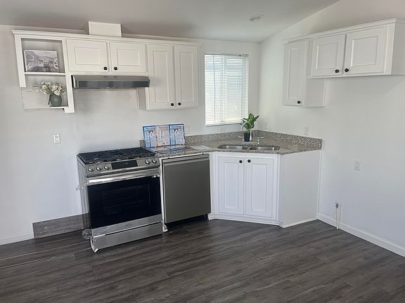 2nd image of 7560 Woodman Pl #66