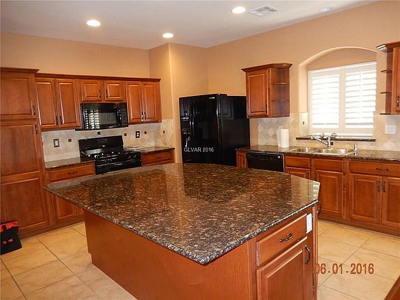 2nd image of 9528 Victory Garden Ave #0