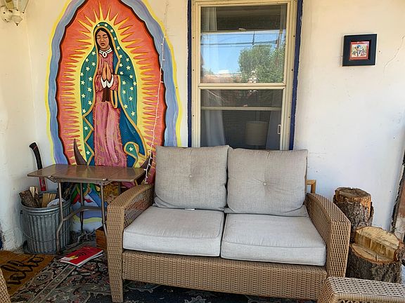 Private front porch with mural