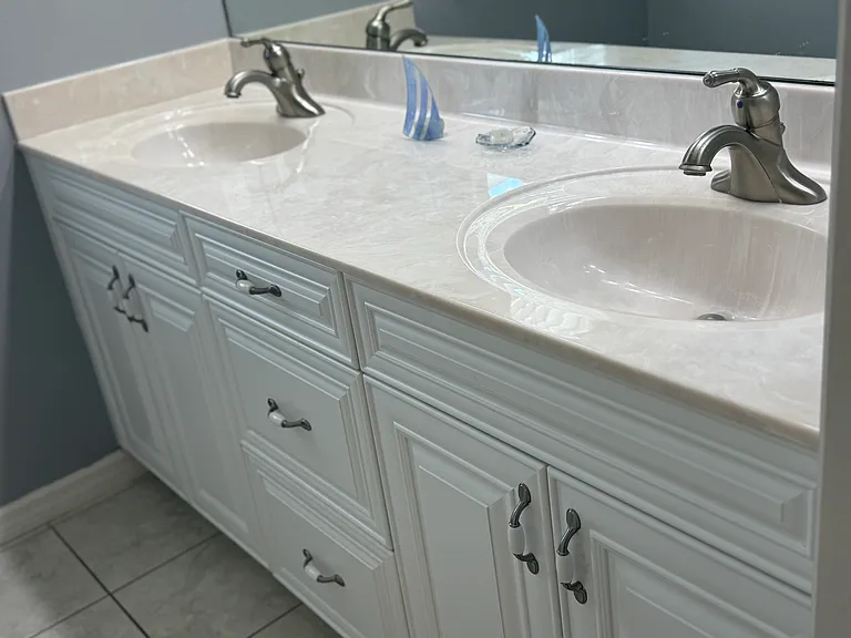 Second Full Bath with dual sinks and pocket door to seperate room with shower and toilet