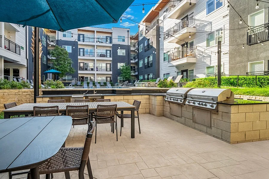 Onsite grill with dining tables and seating