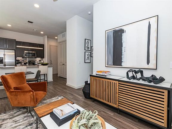 Magnolia on The Green living room space with wooden flooring
