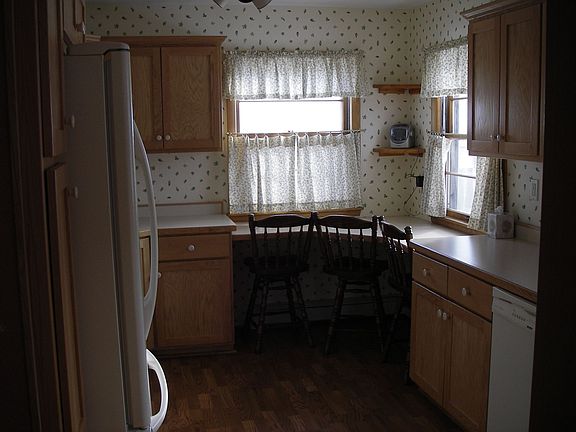 Kitchen view from dining room with brand new dishwasher, too.