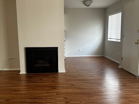 Gas Fireplace in living room. Photo taken at 11: 45am.