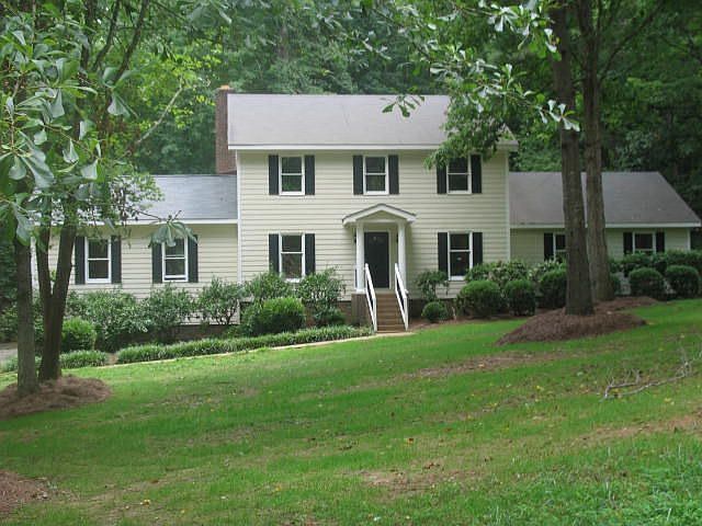 Front Yard with sprinklers and new lawn