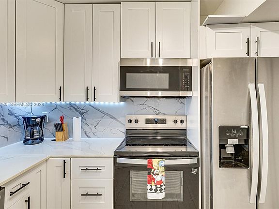 5th image of 250 181st Dr APT 102