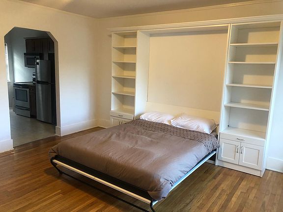 Murphy bed down. Comes with new Tuft and Needle mattress!
