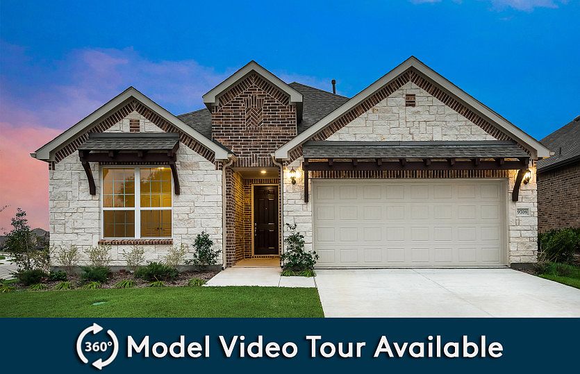 Exterior D with stone and a 2-car garage with storage space