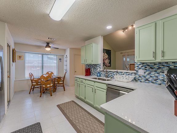 Large kitchen with cozy breakfast nook.