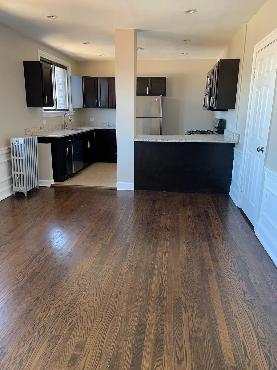 Building Photo - 5653 N Spaulding Ave #3E