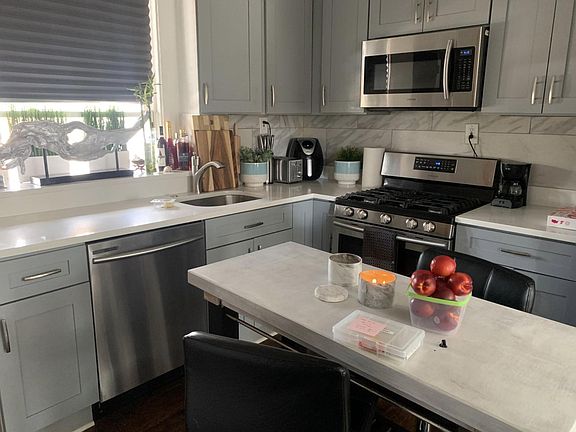 Kitchen with SS Appliances