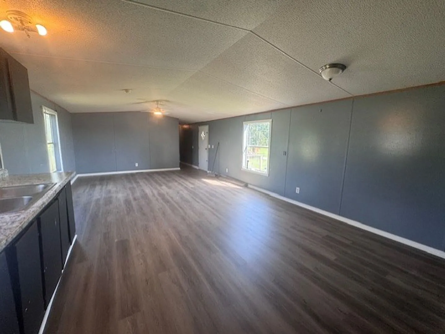 Affordable 3/2 Home with Water, Trash, and Lawn Care Included! — Photo 3