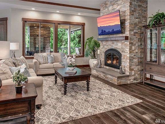 Cozy up on cool nights with this wood burning natural stone fireplace. Gas line has been ran for easy conversion.