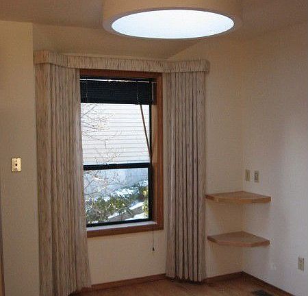 Eating area off Kitchen with round skylight
