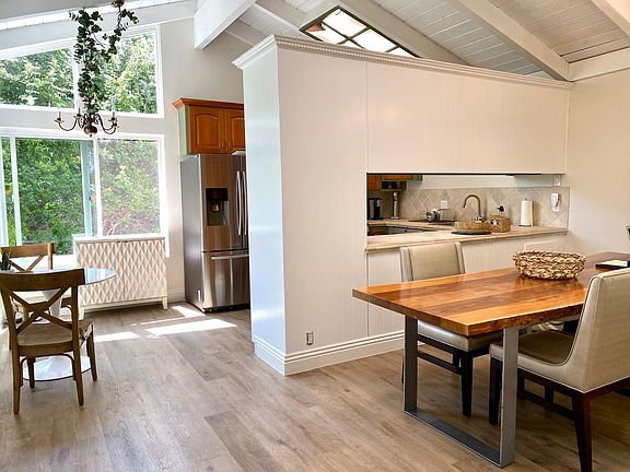 Top floor with spacious entry, dining room, kitchen and nook.