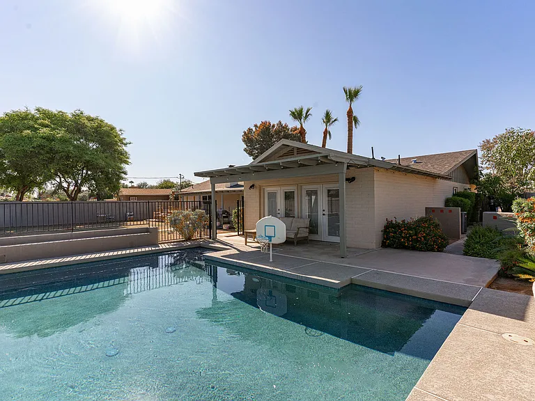 Pebble tec pool with basketball hoop!