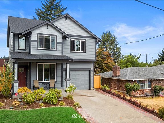Situated on a nice lot with plenty of parking in the driveway with decorative pavers for added parking