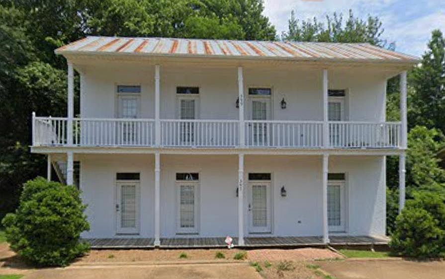 399 is the entire up stairs of the building. 2 private off street parking spaces are included.