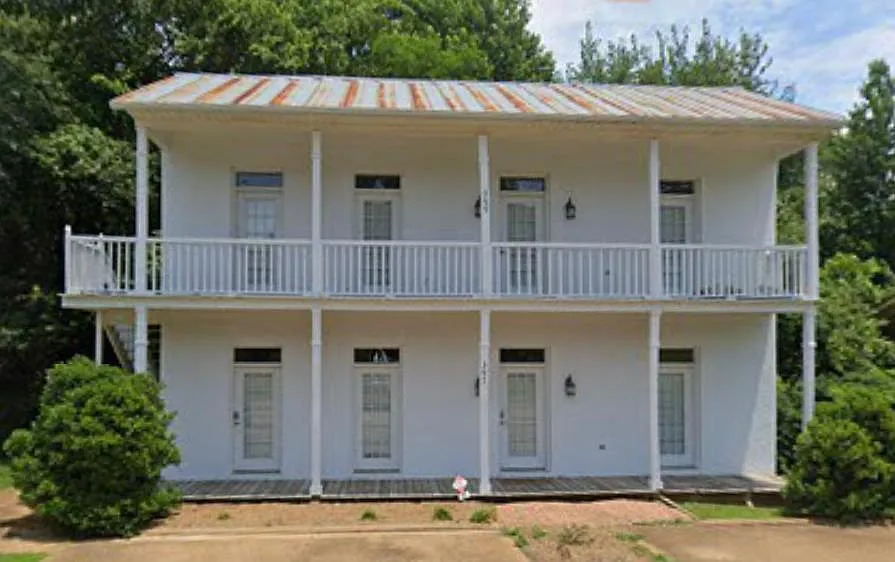 399 is the entire up stairs of the building. 2 private off street parking spaces are included.