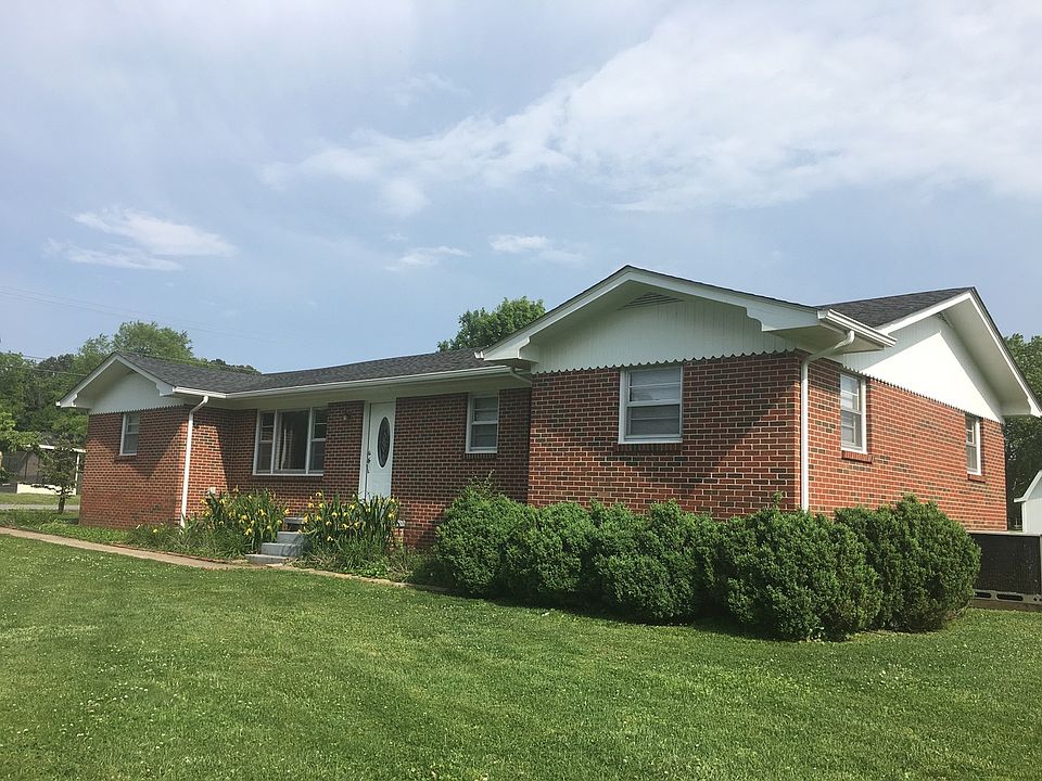 Welcome to 1101 W Lincoln on the corner of Hillcrest. Turn on Hillcrest and enter driveway on right. Sidewalk to front entrance.