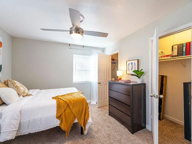 Grove at Southwood Model Bedroom and closet and bathroom door