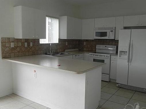 3rd image of 1966 SE 3rd Dr #0