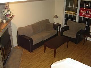 Living room with NEW neutral paint and NEW trim!