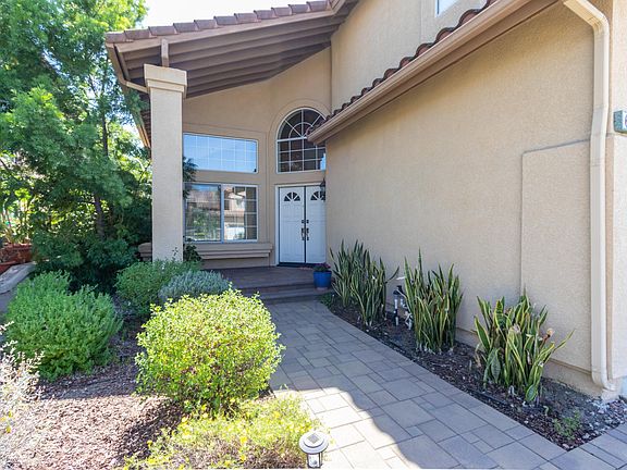 Paver walkway to the covered entry.