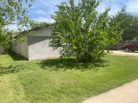 Left side of the house.