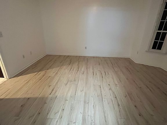 Primary bedroom, pictured as renovated