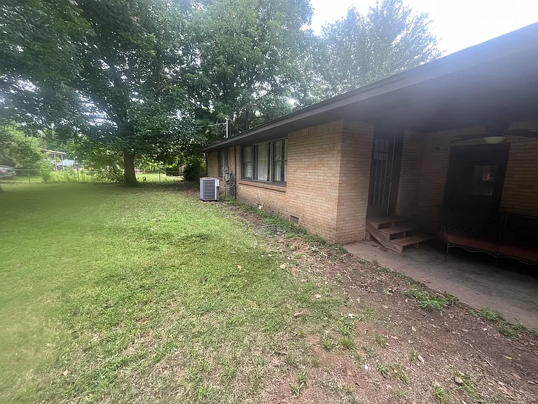 large back yard, sofa included