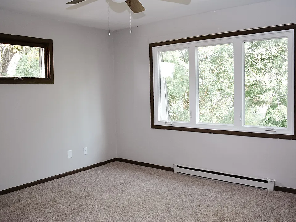 Two bedrooms with lots of natural light and new carpet