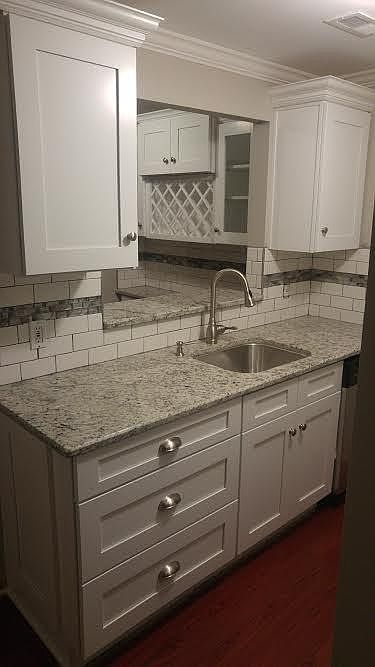 Brand new remodeled open concept kitchen with granite counters and bar/seating area