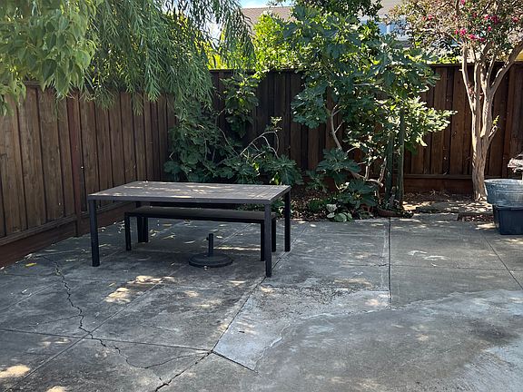 Beautiful trees surround you in your peaceful patio gated area.