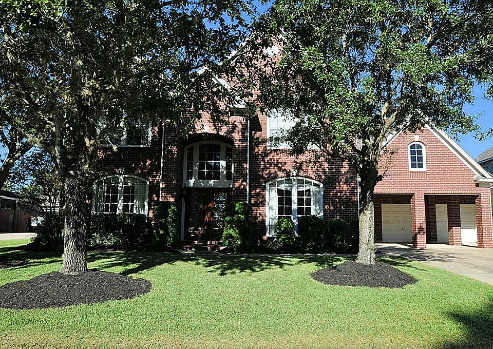 Front of home is freshly landscaped