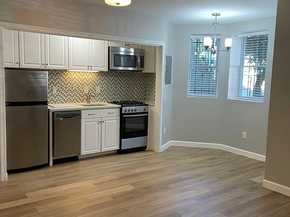 Main living area with front bay window