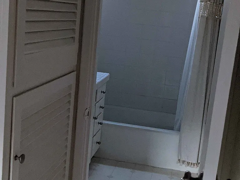 Linen closet and bathroom.