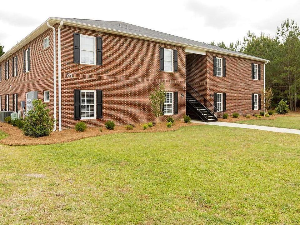 All brick. Clean and attractive buildings with lots of greenspace.