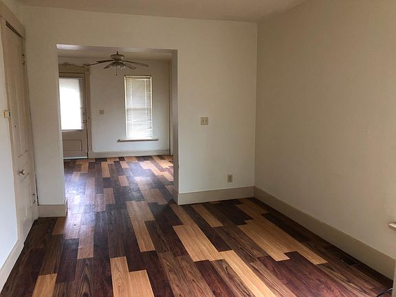 Dining room with a coat closet.