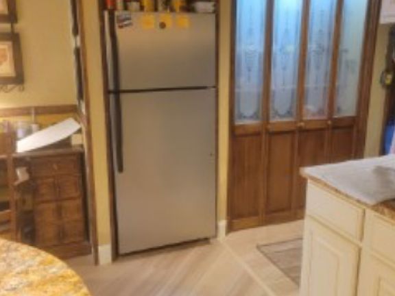 From kitchen, fridge included.. Large Pantry