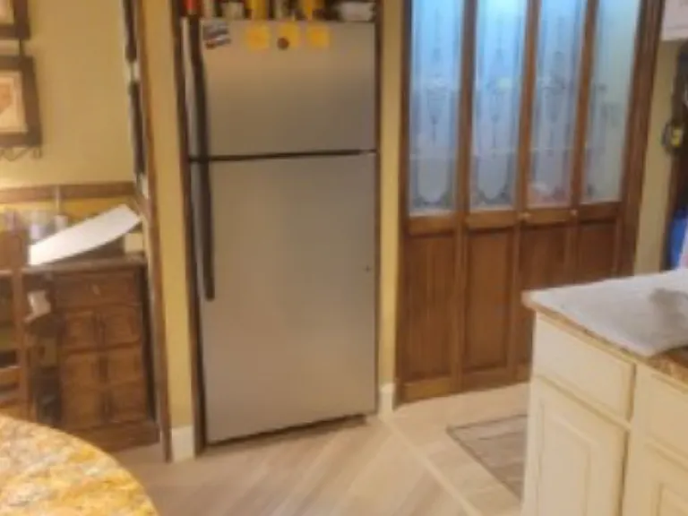 From kitchen, fridge included.. Large Pantry